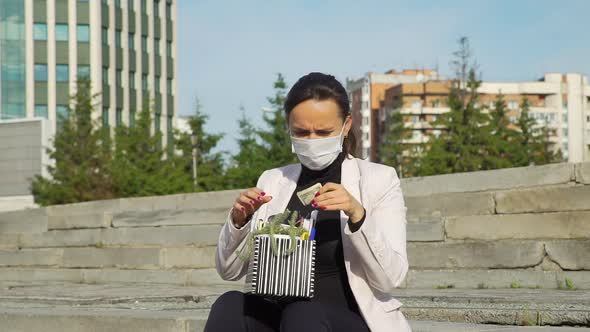 Bankruptcy Fired Woman in Mask Sitting on Steps