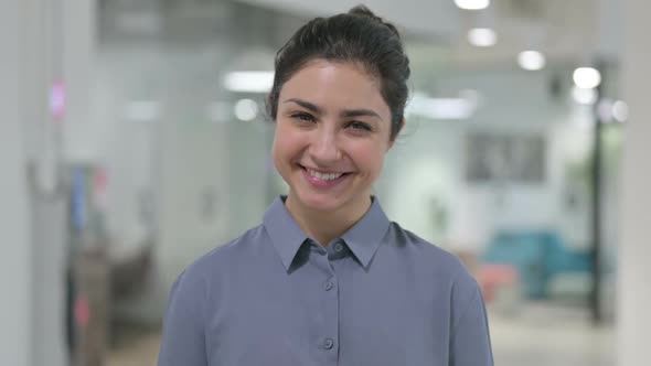 Portrait of Head Shake As Yes Gesture By Indian Woman