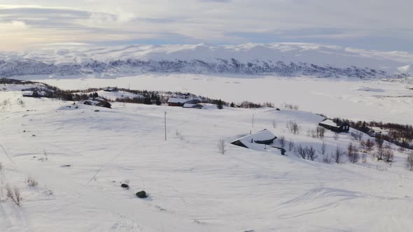 Amazing White Mountain View In Huagastol Norway In Winter - aerial shot