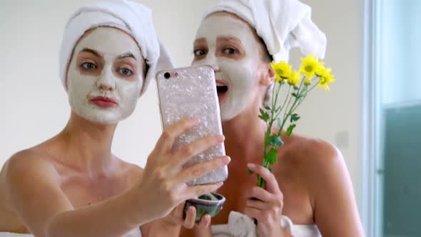 Beautiful Woman Having a Facial Treatment at Spa