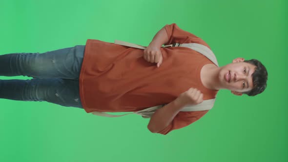 The Front View Of Asian Boy Student Running To School On Green Screen Chroma Key