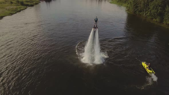 Fly Board Rider on the River