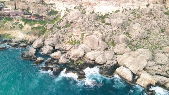 Aerial View of Anchor Bay From Drone in Mellieha Malta