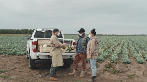 Couple Buying Vegetables