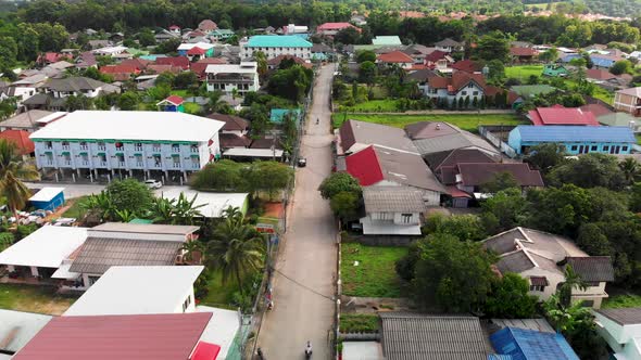 Aerial view of a neighborhood street in Chiang Rai, Thailand.