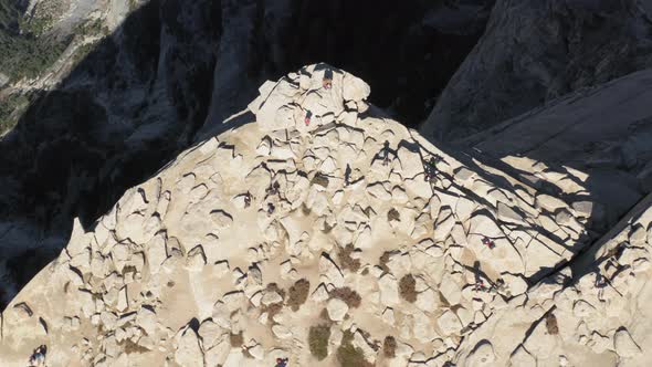 Top Down Aerial View Over the Edge of Half Dome Mountain Top. Yosemite National Park