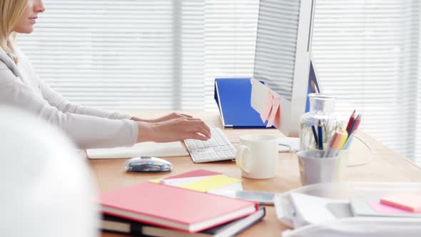 Businesswoman working over computer