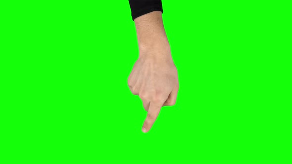 Man Hand in Black Sweater Is Performing Swipes Left and Right at Tablet Screen Gesture on Green