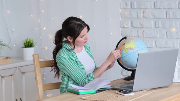 Portrait Business Woman Holding a Globe