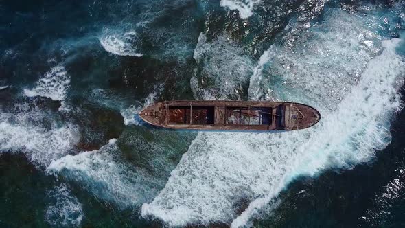 Aerial Drone Shot of Cargo Shipwreck in Paphos with Waves Cyprus Island