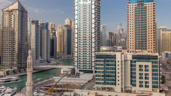 Dubai Marina Skyscrapers Port with Luxury Yachts and Marina Promenade Aerial Timelapse Dubai United