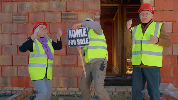 Diverse Team of Specialists Celebrate Success Win Dance Rejoices Doing Winner Gesture Near House