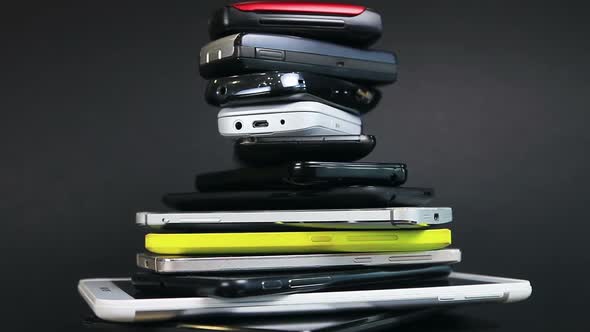 Old, Broken and Scratched Smartphones and Mobile Phones