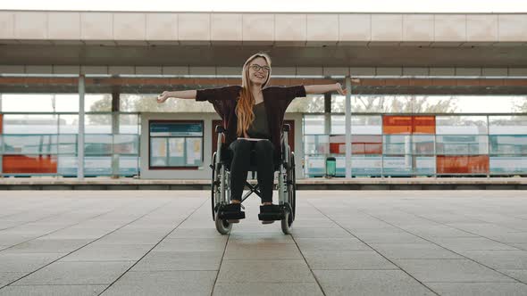 Happy Young Independent Disabled Woman on the Train Station