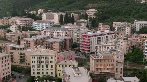 Apartment building district of Genoa city, cinematic aerial drone view