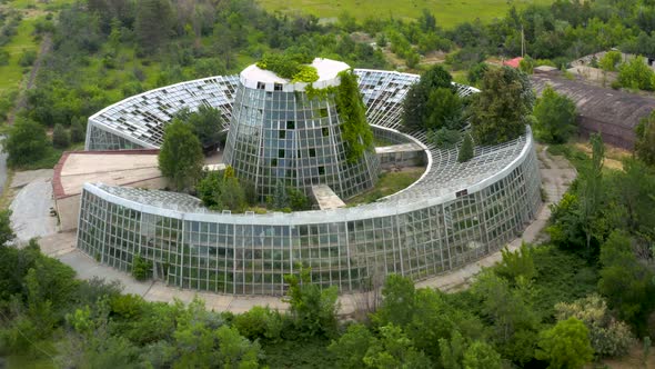 Science Botanical Garden, Round Building with Glass Windows Observatory, Trees Plants Drone Footage