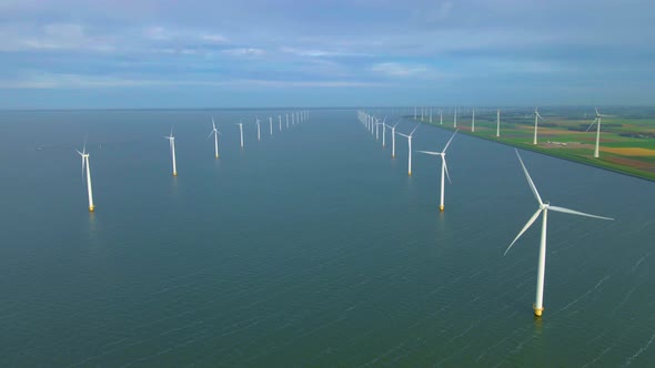 Windmill Park in the Ocean Drone Aerial View of Windmill Turbines Generating Green Energy Electric
