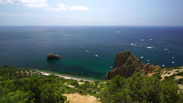 Aerial Panoramic View of Seascape with Crystal Clear Azure Sea and Rocky Shores