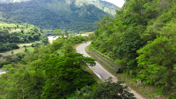 Philippines Mountain Landscape. Winding Rainforest Road in Cordillera Mountains