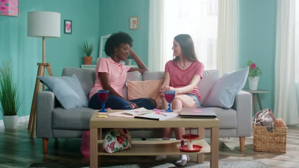 Mixed Race Women Students Relax at Home