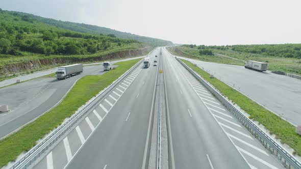 Aerial Drone View of Highway Traffic and Truccks at Pullout Rest Stop in the Summer