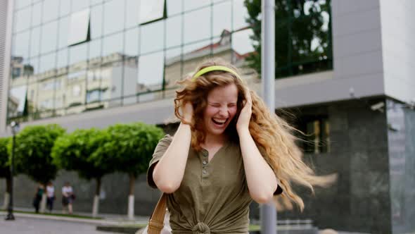 Attractive and Funny Lady Dancing in the Middle of