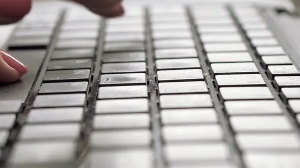 girl typing on the keyboard