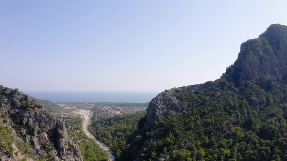 Beautiful Rocky Landscape with View of Rural Road and Mountain Village