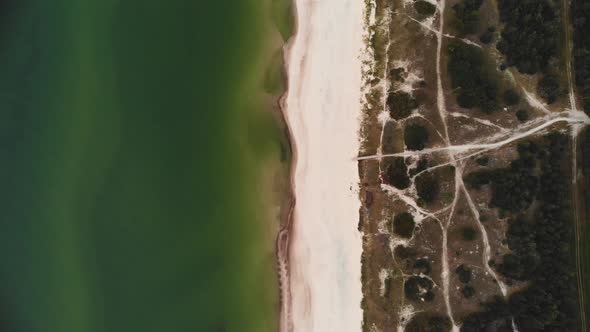 AERIAL: Flying Very High Above Seashore and Beach