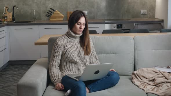 An Home Office Worker Works on a Computer Then Gets Angry