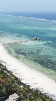 Tanzania  Vertical Video House on Stilts in the Ocean on the Coast of Zanzibar Slow Motion