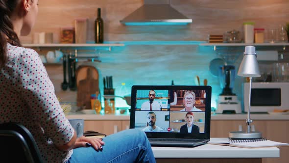 Hispanic Woman on Video Conference Working From Home