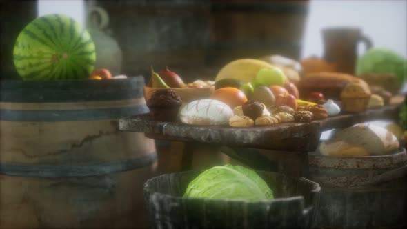 Food Table with Wine Barrels and Some Fruits, Vegetables and Bread