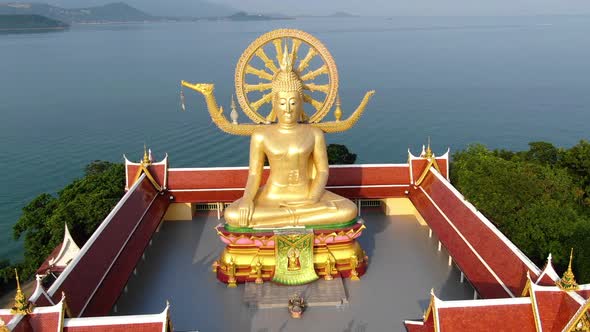 Thailand landmark. Aerial view of golden big Buddha temple