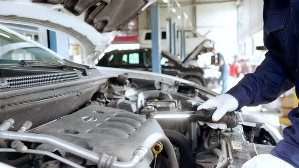 Car Mechanic Work in a Car Repair Shop