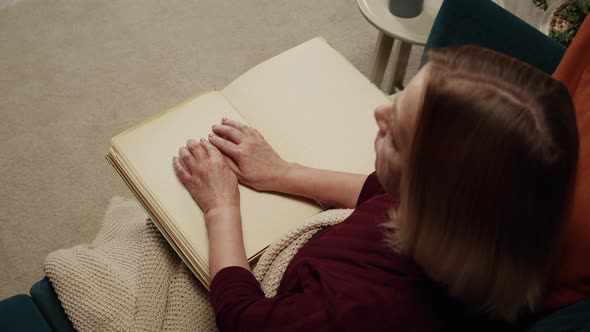 Blind Woman Reading Braille Book Top View Poorly Seeing Female Person Learning to Read Home