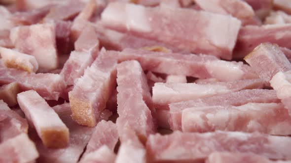 Chopped slices of cooked bacon