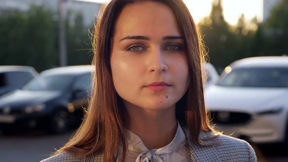 Beautiful Young Woman Smiling at Camera Slow Motion Sunlight