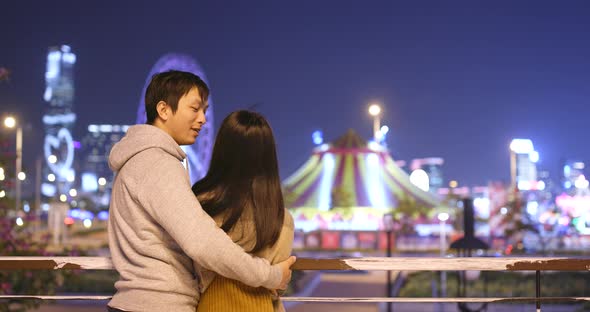 Couple Looking at Tourist Attraction View in Hong Kong at Night