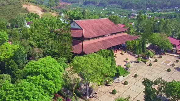 Drone Removes From Temple Complex Among Tropical Hills