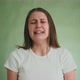 Despaired Woman Cries and Yells with Sad Grimace on Green - VideoHive Item for Sale