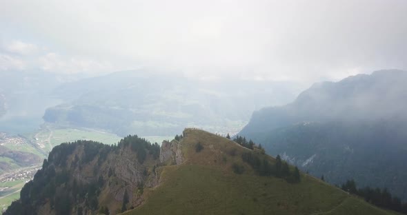 This Drone shot is taken from a mountain Top in Switzerland. The mountain is called Hirzli and is lo