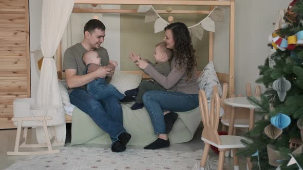 Parents Playing with Children in Christmas Day