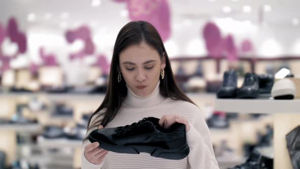 The Girl Chooses Shoes and Refuses Them