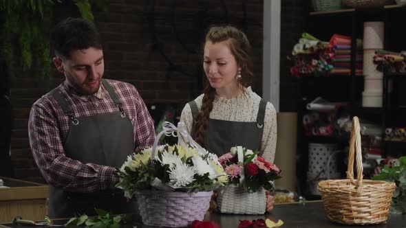 Two Florists Picking Flower Baskets