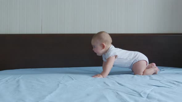 Happy Baby Crawls n the Bed