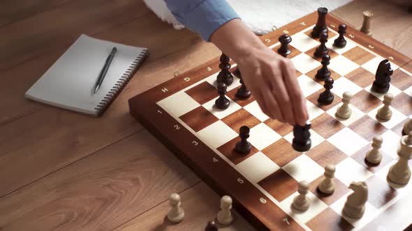 Women's Hands Make A Move With A Chess Piece On A Chessboard Girl Playing Chess Holding