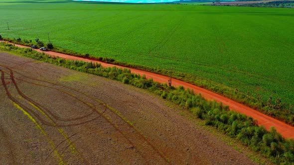 Huge areas of the Brazilian Savannah deforested so farms can grow profit harvests - aerial view of a