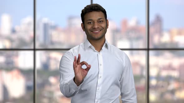 Young Happy Businessman Showing Ok Sign