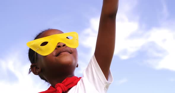 Boy pretending to be a super hero